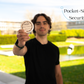 Man holding a compact tin labeled 'Homemade Foot Lotion' in an outdoor setting, emphasizing pocket-sized security for your crypto hardware wallet.