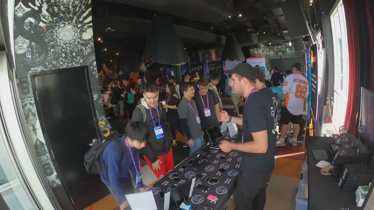 A timelapse of visitors meeting the Crypto Seed Bank team and exploring products at the Blockchain Futurist Conference booth.